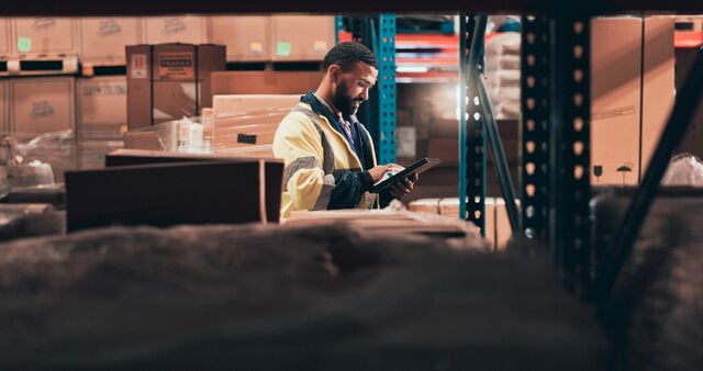 small-SINGLE-IMAGE_black-male-warehouse-worker-with-tablet-full-colour_july25