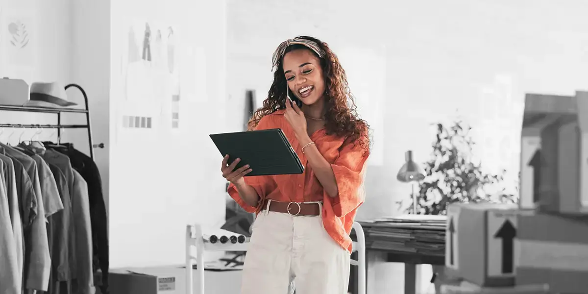 Retail manager reviewing performance data on a tablet